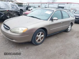 2003 Ford Taurus SE with VIN 1FAHP58U83A195059, listed as a IAAI auction lot 41931098 with 211,096 mi miles and . Bid and sale history available at carsss.com. Image 2.