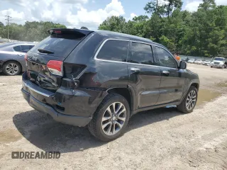 2018 Jeep Grand Cherokee Sterling z VIN 1C4RJEBG4JC241944, wystawiony jako Copart lot #61679565 z przebiegiem 83 480 mil mil oraz Szkoda całkowita • Salvage title. Historia ofert i sprzedaży dostępna na DreamBid. Obrazek 3.