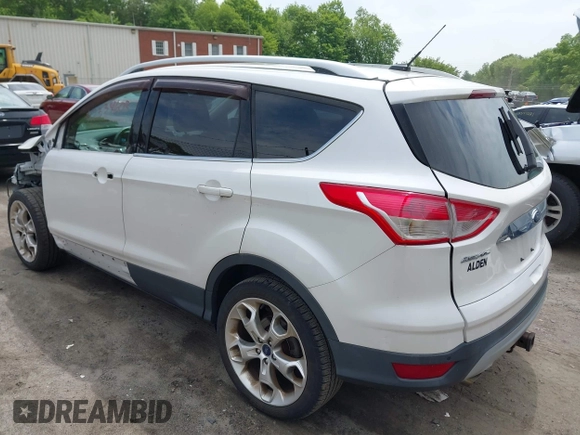 2016 Ford Escape Titanium with VIN 1FMCU9J92GUA71444, listed as a IAAI auction lot 42334603 with 79,780 mi miles and . Bid and sale history available at DreamBid. Image 3.