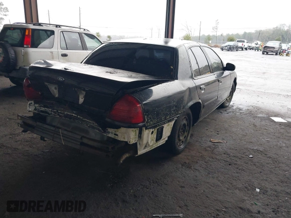 2000 Ford Crown Victoria Police Interceptor z VIN 2FAFP71W4YX199199, wystawiony jako IAAI lot #41610176 z przebiegiem 202 131 mil mil oraz . Historia ofert i sprzedaży dostępna na DreamBid. Obrazek 4.