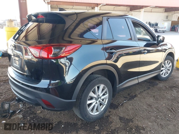 2016 Mazda CX-5 Sport with VIN JM3KE4BY8G0829002, listed as a IAAI auction lot 42553846 with 103,231 mi miles and . Bid and sale history available at DreamBid. Image 4.