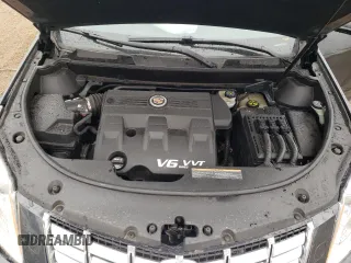 2014 Cadillac SRX Performance Collection z VIN 3GYFNCE36ES661204, wystawiony jako Copart lot #53478095 z przebiegiem 66 613 mil mil oraz Szkoda całkowita • Salvage title. Historia ofert i sprzedaży dostępna na DreamBid. Obrazek 11.