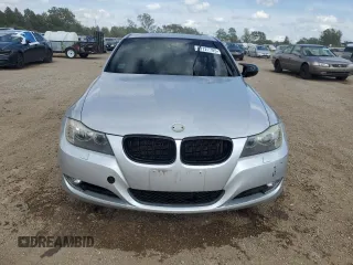 2011 BMW 3 Series 328i xDrive with VIN WBAPK5G57BNN31318, listed as a Copart auction lot 61127785 with Not provided miles and Salvage title. Bid and sale history available at DreamBid. Image 5.