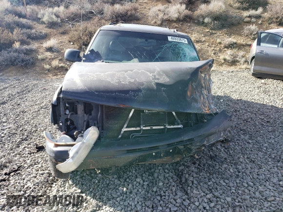 2002 Chevrolet Suburban LT with VIN 1GNFK16T02J261631, listed as a Copart auction lot 46933875 with Not provided miles and Salvage title. Bid and sale history available at DreamBid. Image 5.