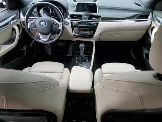 2018 BMW X2 sDrive28i with VIN WBXYJ3C35JEJ89968, listed as a Copart auction lot 87488354 with 68,945 mi miles and Salvage title. Bid and sale history available at DreamBid. Image 8.