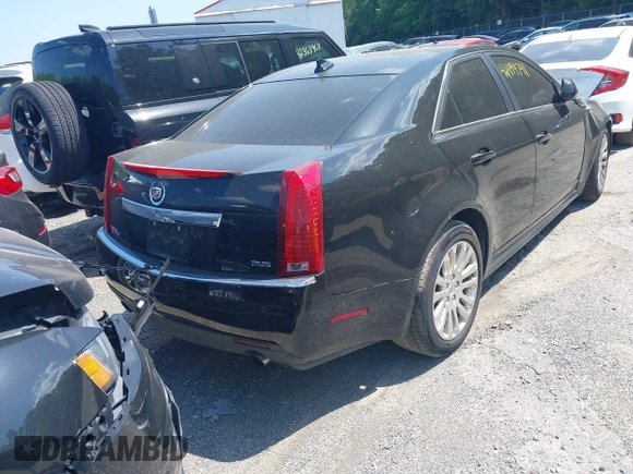 2011 Cadillac CTS Premium with VIN 1G6DS5ED4B0105859, listed as a IAAI auction lot 42494741 with 143,128 mi miles and . Bid and sale history available at DreamBid. Image 4.