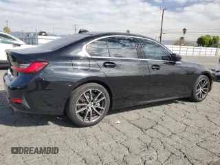 2020 BMW 3 Series 330i with VIN WBA5R1C02LFH42057, listed as a Copart auction lot 47142865 with 200,121 mi miles and Clean Title. Bid and sale history available at carsss.com. Image 3.