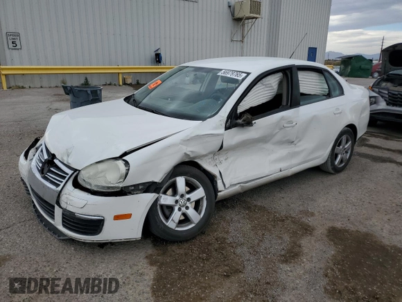 2009 Volkswagen Jetta S with VIN 3VWJM71K69M035974, listed as a Copart auction lot 56979765 with Not provided miles and Salvage title. Bid and sale history available at DreamBid. Image 1.