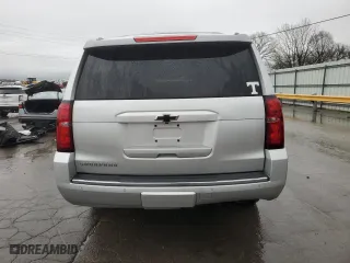 2015 Chevrolet Suburban LTZ with VIN 1GNSCKKCXFR587516, listed as a Copart auction lot 50877665 with 193,618 mi miles and Salvage Title. Bid and sale history available at carsss.com. Image 6.