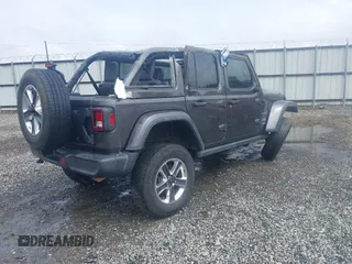2019 Jeep Wrangler Unlimited Sahara с VIN 1C4HJXEG8KW627530, выставлен на аукционе IAAI как лот 42122544 с пробегом 118 064 миль миль и . История ставок и продаж доступна на DreamBid. Изображение 4.
