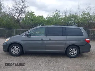 2007 Honda Odyssey EX-L with VIN 5FNRL38767B406636, listed as a IAAI auction lot 42032947 with 228,139 mi miles and . Bid and sale history available at carsss.com. Image 14.