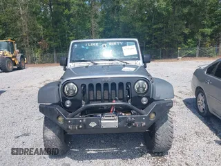 2015 Jeep Wrangler Freedom Edition with VIN 1C4AJWAG4FL589769, listed as a IAAI auction lot 42704488 with 194,414 mi miles and . Bid and sale history available at DreamBid. Image 12.