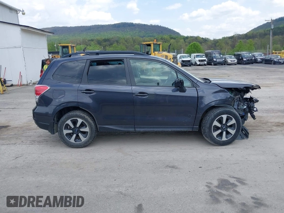 2018 Subaru Forester z VIN JF2SJABC9JH606789, wystawiony jako IAAI lot #42143762 z przebiegiem 70 695 mil mil oraz . Historia ofert i sprzedaży dostępna na DreamBid. Obrazek 14.
