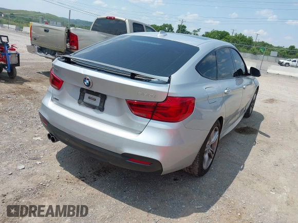 2018 BMW 3 Series 330i xDrive with VIN WBA8Z9C54JG828210, listed as a IAAI auction lot 42468521 with 72,741 mi miles and . Bid and sale history available at DreamBid. Image 4.