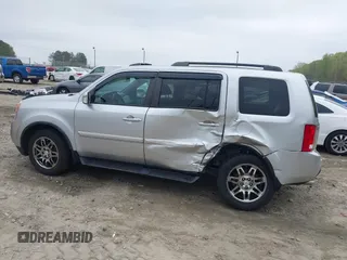 2014 Honda Pilot Touring with VIN 5FNYF4H91EB011934, listed as a IAAI auction lot 41929415 with 227,343 mi miles and . Bid and sale history available at DreamBid. Image 6.
