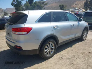 2017 Kia Sorento LX z VIN 5XYPG4A32HG210423, wystawiony jako IAAI lot #42283318 z przebiegiem 135 063 mil mil oraz . Historia ofert i sprzedaży dostępna na DreamBid. Obrazek 4.