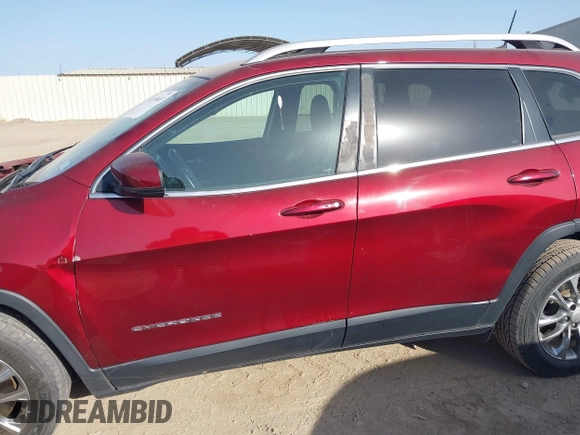 2019 Jeep Cherokee Altitude with VIN 1C4PJLLXXKD120325, listed as a IAAI auction lot 41838643 with 124,315 mi miles and . Bid and sale history available at DreamBid. Image 15.