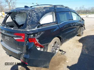 2022 Honda Odyssey Elite z VIN 5FNRL6H99NB066589, wystawiony jako IAAI lot #41868201 z przebiegiem 79 113 mil mil oraz . Historia ofert i sprzedaży dostępna na DreamBid. Obrazek 4.
