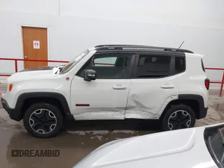 2015 Jeep Renegade Trailhawk with VIN ZACCJBCT2FPC33277, listed as a IAAI auction lot 41571863 with 98,912 mi miles and . Bid and sale history available at DreamBid. Image 15.