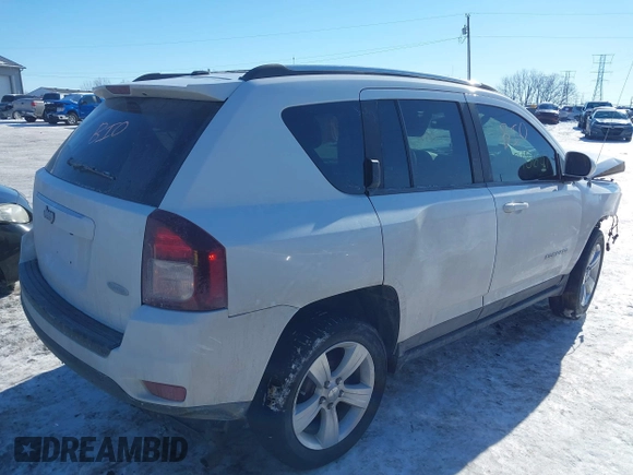 2014 Jeep Compass Latitude with VIN 1C4NJCEB1ED560365, listed as a IAAI auction lot 41348657 with 108,931 mi miles. Bid and sale history available at carsss.com. Image 4.