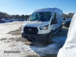 2023 Ford Transit Cargo with VIN 1FTBR1C84PKB27872, listed as a IAAI auction lot 41025498 with 6,710 mi miles and . Bid and sale history available at DreamBid. Image 2.