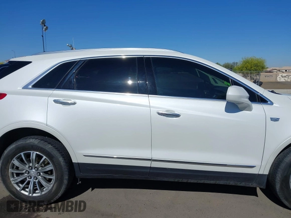 2017 Cadillac XT5 Luxury AWD z VIN 1GYKNDRS8HZ120863, wystawiony jako IAAI lot #42101279 z przebiegiem 100 535 mil mil oraz . Historia ofert i sprzedaży dostępna na DreamBid. Obrazek 14.