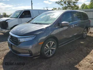 2023 Honda Odyssey Touring with VIN 5FNRL6H80PB019252, listed as a Copart auction lot 55947285 with Not provided miles and Salvage title. Bid and sale history available at DreamBid. Image 1.