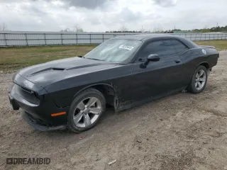 2021 Dodge Challenger SXT with VIN 2C3CDZAG1MH623487, listed as a Copart auction lot 48225645 with 77,086 mi miles and Salvage Title. Bid and sale history available at carsss.com. Image 1.