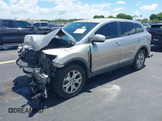 2011 Mazda CX-9 Sport with VIN JM3TB2BA3B0308508, listed as a IAAI auction lot 42517371 with 139,986 mi miles and . Bid and sale history available at DreamBid. Image 2.