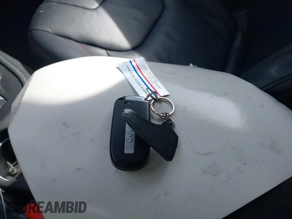 2015 Jeep Cherokee Trailhawk z VIN 1C4PJMBS3FW520328, wystawiony jako IAAI lot #41746017 z przebiegiem 83 485 mil mil oraz . Historia ofert i sprzedaży dostępna na DreamBid. Obrazek 11.