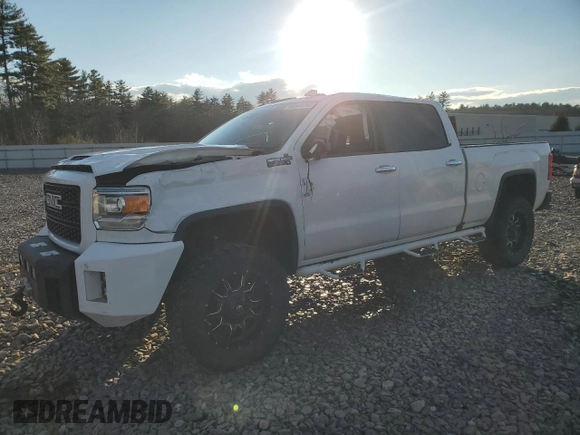 2019 GMC Sierra 2500HD Denali with VIN 1GT12SEY2KF132248, listed as a Copart auction lot 84638294 with 89,115 mi miles and Salvage Title. Bid and sale history available at carsss.com. Image 1.