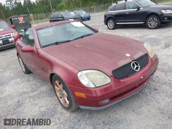 1999 Mercedes-Benz SLK 230/320 z VIN WDBKK47F3XF101074, wystawiony jako IAAI lot #42291770 z przebiegiem 141 195 mil mil oraz . Historia ofert i sprzedaży dostępna na DreamBid. Obrazek 1.
