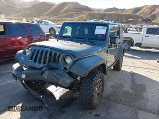 2014 Jeep Wrangler Unlimited Rubicon X with VIN 1C4BJWFG3EL134522, listed as a IAAI auction lot 41221381 with 66,897 mi miles and . Bid and sale history available at DreamBid. Image 2.