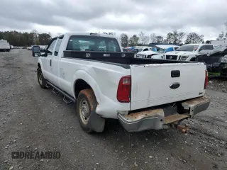2011 Ford F-250 XL with VIN 1FT7X2A6XBEA83144, listed as a Copart auction lot 79005584 with 207,398 mi miles and Salvage title. Bid and sale history available at DreamBid. Image 2.
