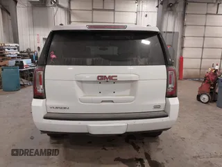 2015 GMC Yukon SLE with VIN 1GKS2AKC6FR103447, listed as a IAAI auction lot 41596220 with 104,209 mi miles. Bid and sale history available at carsss.com. Image 16.