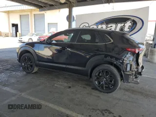 2024 Mazda CX-30 S Select Sport with VIN 3MVDMBBM8RM658675, listed as a Copart auction lot 61963635 with 8,497 mi miles and Salvage title. Bid and sale history available at DreamBid. Image 2.