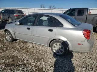 2005 Suzuki Forenza S z VIN KL5JD56Z95K119565, wystawiony jako Copart lot #43051135 z przebiegiem 143 172 mil mil oraz Nie do naprawy • Non repairable. Historia ofert i sprzedaży dostępna na DreamBid. Obrazek 2.