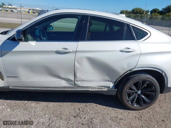 2016 BMW X6 xDrive35i with VIN 5UXKU2C57G0N81974, listed as a IAAI auction lot 41821867 with 144,643 mi miles. Bid and sale history available at carsss.com. Image 17.
