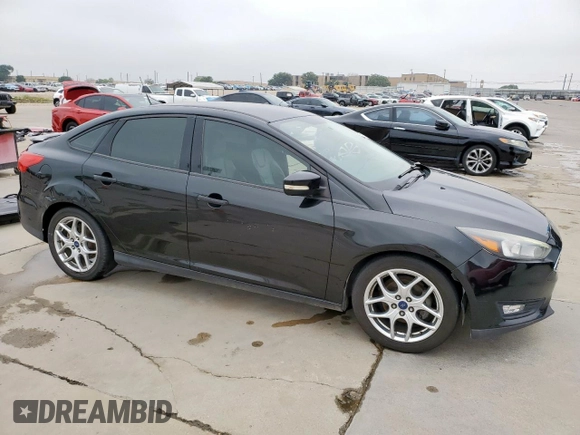 2015 Ford Focus SE z VIN 1FADP3F29FL357021, wystawiony jako Copart lot #57985125 z przebiegiem 142 786 mil mil oraz Szkoda całkowita • Salvage title. Historia ofert i sprzedaży dostępna na DreamBid. Obrazek 4.