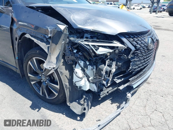 2022 Lexus UX 200 с VIN JTHX3JBH7N2055392, выставлен на аукционе IAAI как лот 42282895 с пробегом 46 776 миль миль и . История ставок и продаж доступна на DreamBid. Изображение 6.