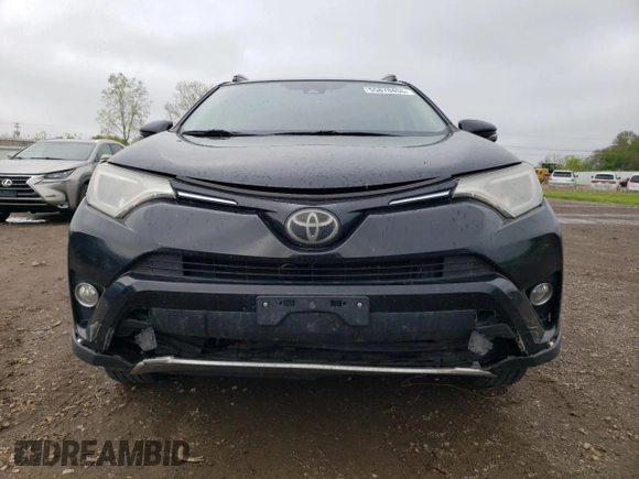 2018 Toyota RAV4 XLE with VIN 2T3WFREV0JW484430, listed as a Copart auction lot 55878455 with 132,335 mi miles and Salvage title. Bid and sale history available at DreamBid. Image 5.