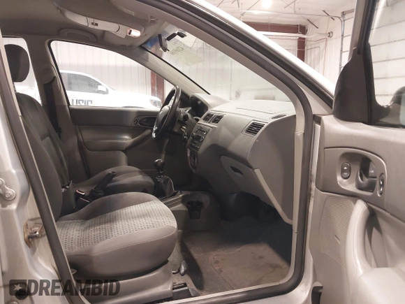 2005 Ford Focus S with VIN 1FAFP34N65W265707, listed as a IAAI auction lot 42169166 with 145,254 mi miles. Bid and sale history available at carsss.com. Image 5.