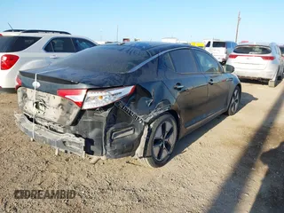 2013 Kia Optima EX with VIN KNAGM4AD8D5053675, listed as a IAAI auction lot 42000423 with 212,320 mi miles and . Bid and sale history available at carsss.com. Image 4.