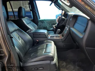 2015 Lincoln Navigator with VIN 5LMJJ2JT7FEJ14653, listed as a Copart auction lot 44921315 with 112,183 mi miles and Salvage Title. Bid and sale history available at carsss.com. Image 7.