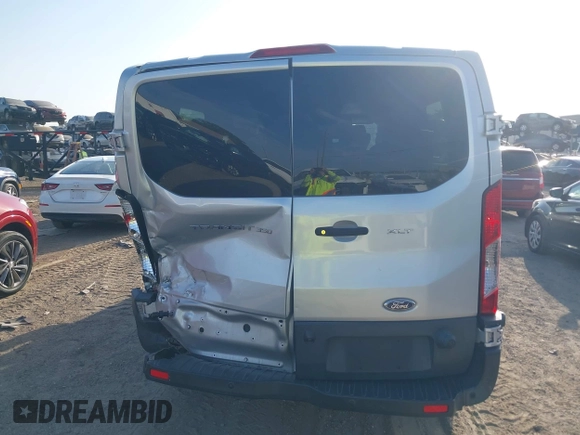2018 Ford Transit Passenger XL with VIN 1FBZX2YM0JKA70128, listed as a IAAI auction lot 42379000 with 125,309 mi miles and . Bid and sale history available at DreamBid. Image 16.