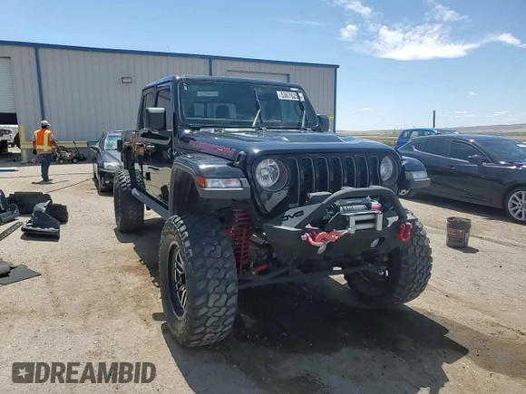 2020 Jeep Gladiator Rubicon z VIN 1C6JJTBG8LL154950, wystawiony jako Copart lot #53676205 z przebiegiem 22 999 mil mil oraz Szkoda całkowita • Salvage title. Historia ofert i sprzedaży dostępna na DreamBid. Obrazek 14.