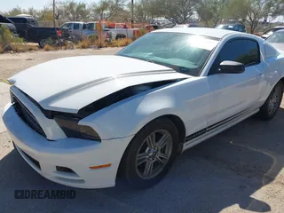 2014 Ford Mustang V6 with VIN 1ZVBP8AM0E5268865, listed as a IAAI auction lot 41884812 with 128,977 mi miles. Bid and sale history available at carsss.com. Image 6.