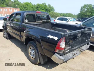 2013 Toyota Tacoma with VIN 3TMMU4FNXDM057020, listed as a IAAI auction lot 42560987 with 177,333 mi miles and . Bid and sale history available at DreamBid. Image 3.