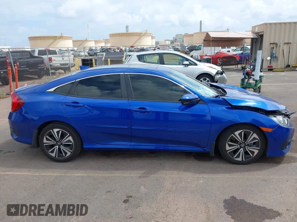 2018 Honda Civic EX-T z VIN JHMFC1F31JX018152, wystawiony jako IAAI lot #41935394 z przebiegiem 60 333 mil mil oraz . Historia ofert i sprzedaży dostępna na DreamBid. Obrazek 13.