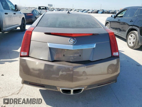 2012 Cadillac CTS Performance z VIN 1G6DJ1E35C0138308, wystawiony jako Copart lot #52984375 z przebiegiem 134 881 mil mil oraz Czysty tytuł • Clean title. Historia ofert i sprzedaży dostępna na DreamBid. Obrazek 6.